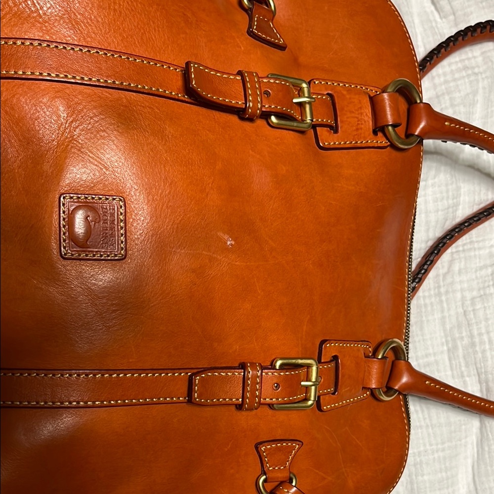 Dooney & Bourke Orange Satchel with High-Quality Leather and Adjustable Straps